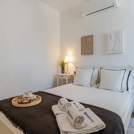 Sleek & Modern Flat W/ Private Garage By Hostwise